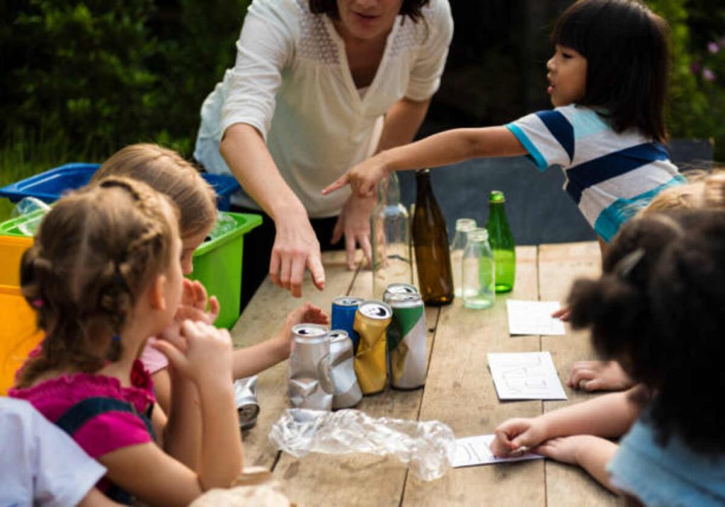 https://media.istockphoto.com/id/670719274/photo/group-of-kids-classmates-learning-biology-recycle-environment.jpg?s=612x612&w=0&k=20&c=9sSv4Rs11Kys6ykqqW6FaMZsqu52lyYTg5tLsTFd1u0=